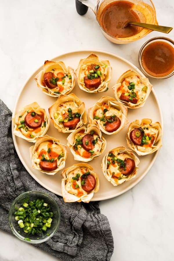 Top down view of a plate of Creole Cream Cheese Wontons