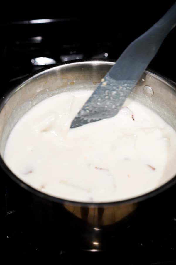 Stirring soup in a pot