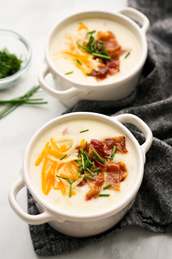 Two bowls of Creamy Potato Bacon Soup