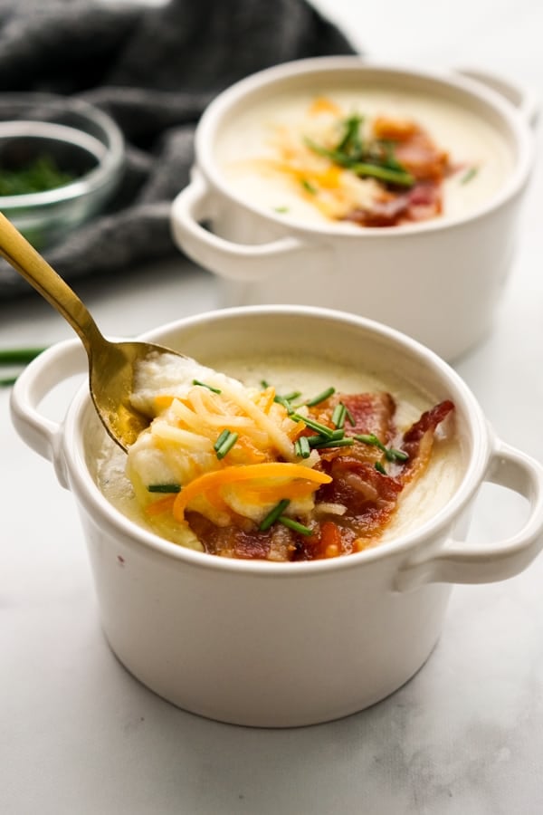Scooping out Potato Bacon Soup with spoon