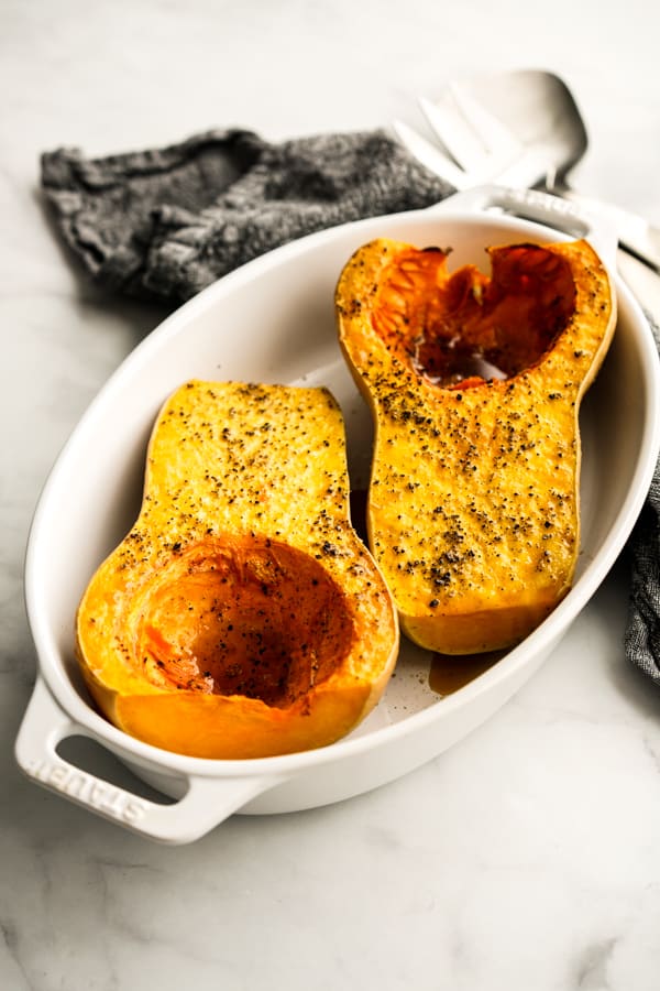 Whole butternut squash cut into half and roasted