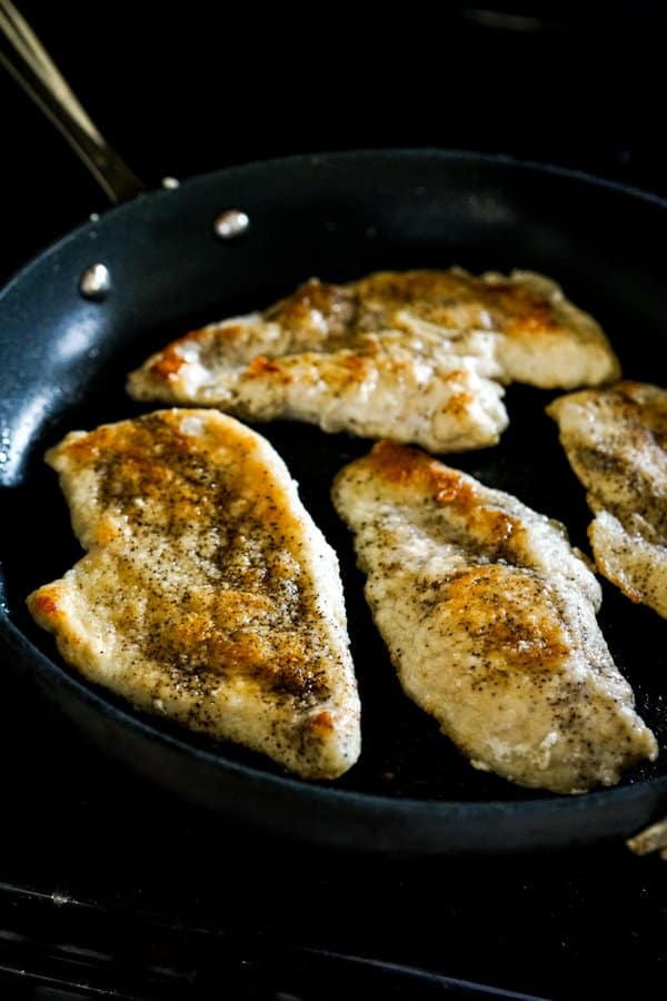 Pan frying chicken cutlets 