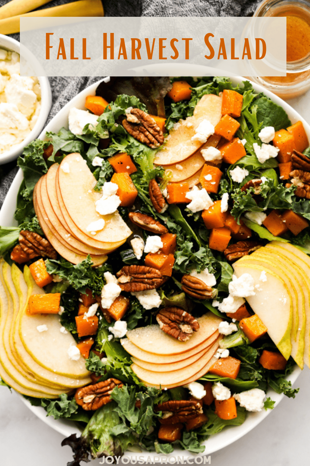 Fall Harvest Salad - Yummy autumn salad with your favorite Fall vegetables and fruits! Kale and mixed greens combined with roasted butternut squash, apples, pears, pecans and crumbled feta. Perfect for the Thanksgiving holidays as well! via @joyousapron