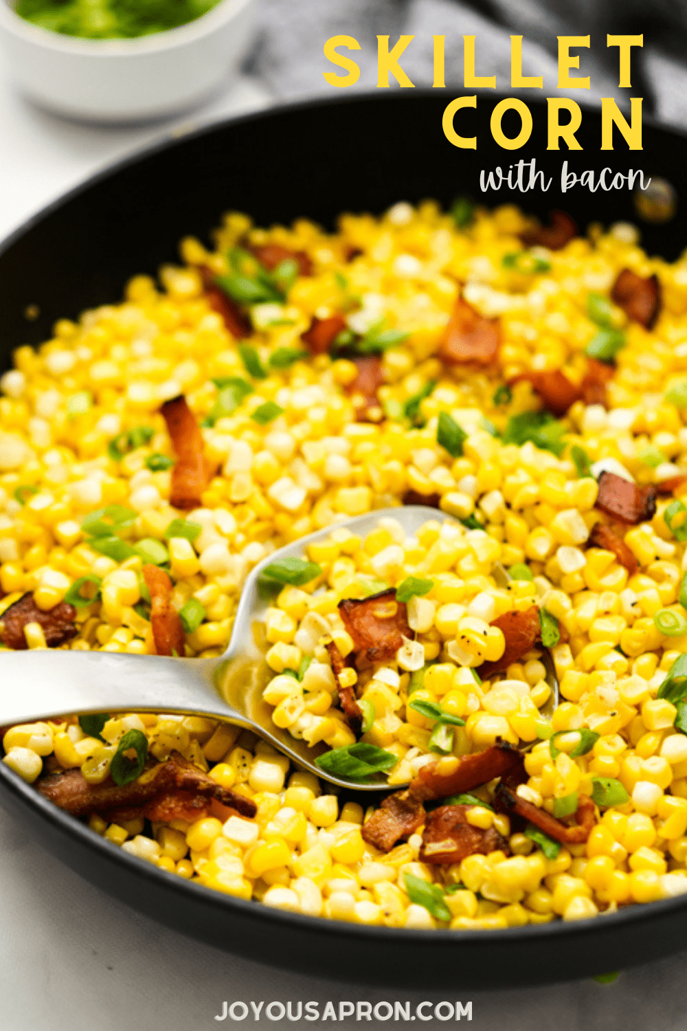Skillet Corn with Bacon - Easy and delicious pan fried corn recipe! Combined with bacon pieces and bacon grease for amazing flavors. A yummy vegetable side dish ready under 15 minutes! via @joyousapron