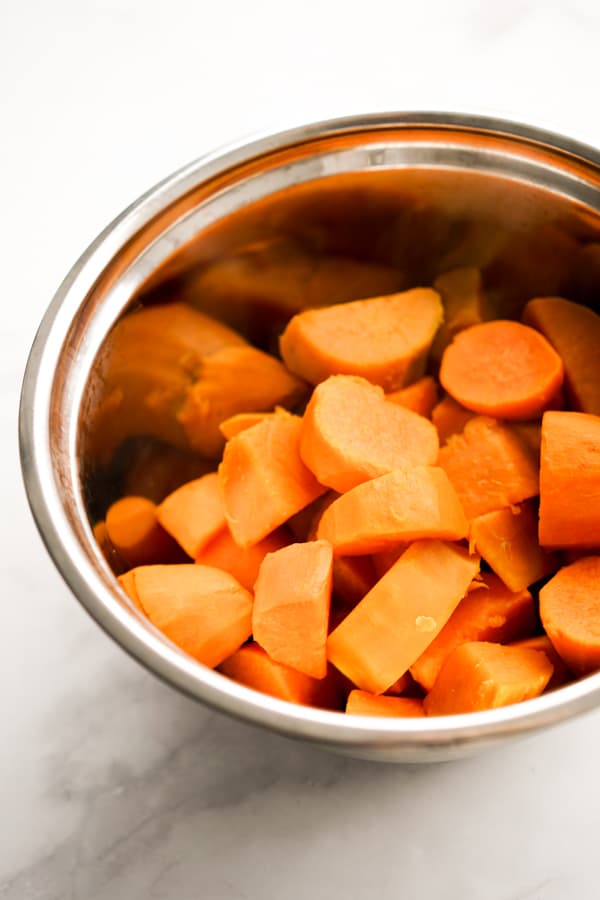 A bowl of boiled cubed sweet potatoes