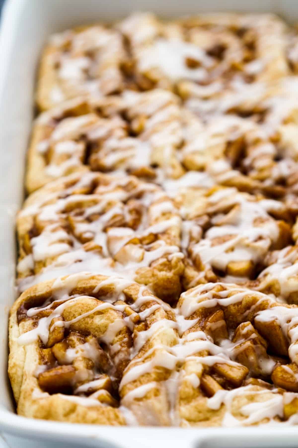 Closeup of cinnamon rolls with apple pie filling