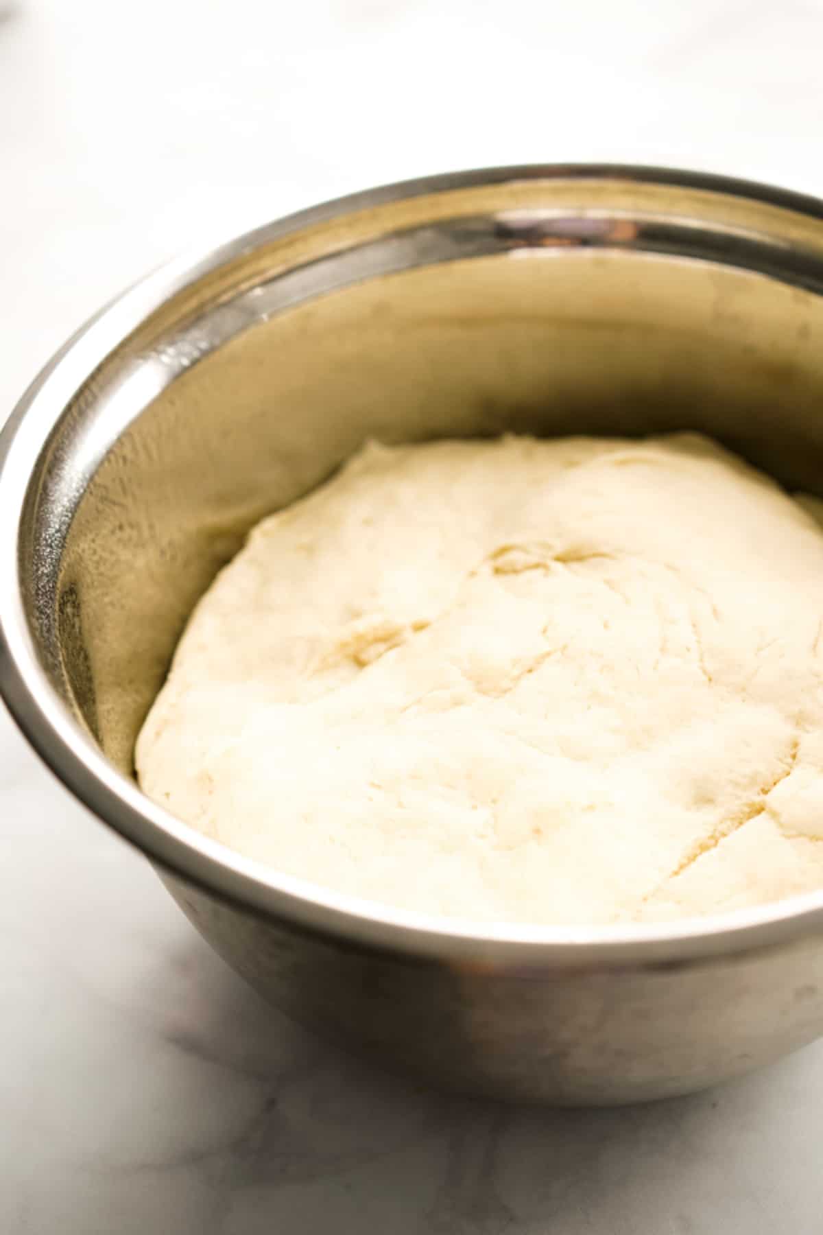 Dough for rolls after it has risen for an hour