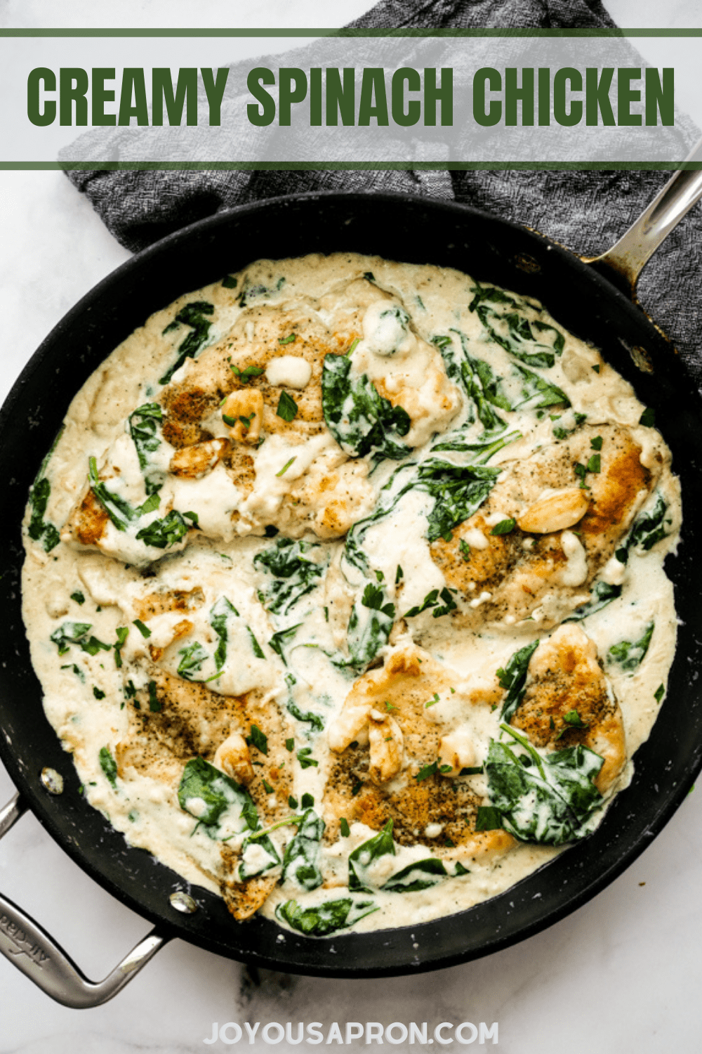 Creamy Spinach Chicken - An easy one-pan skillet chicken recipe for a quick dinner meal! Crispy seasoned chicken coated in creamy garlic spinach sauce. via @joyousapron