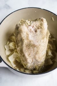 Chicken breast side up in Dutch oven