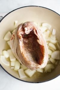 Salt and pepper in the insides of the turkey breast