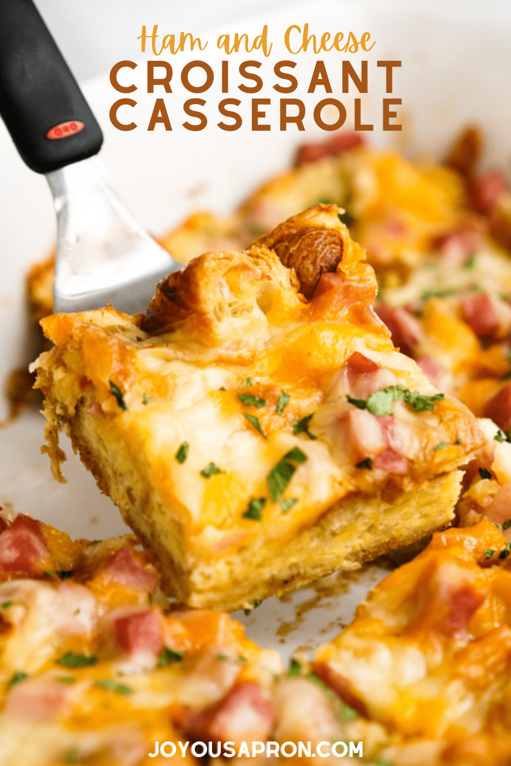 Ham and Cheese Breakfast Bake - a brunch casserole recipe! Soft on the inside and slightly crunchy on the outside, this casserole combines croissants, ham, spices with lots of cheesy goodness. Perfect use of leftover ham! via @joyousapron