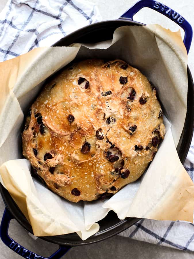 Top down view of no knead bread in a dutch oven