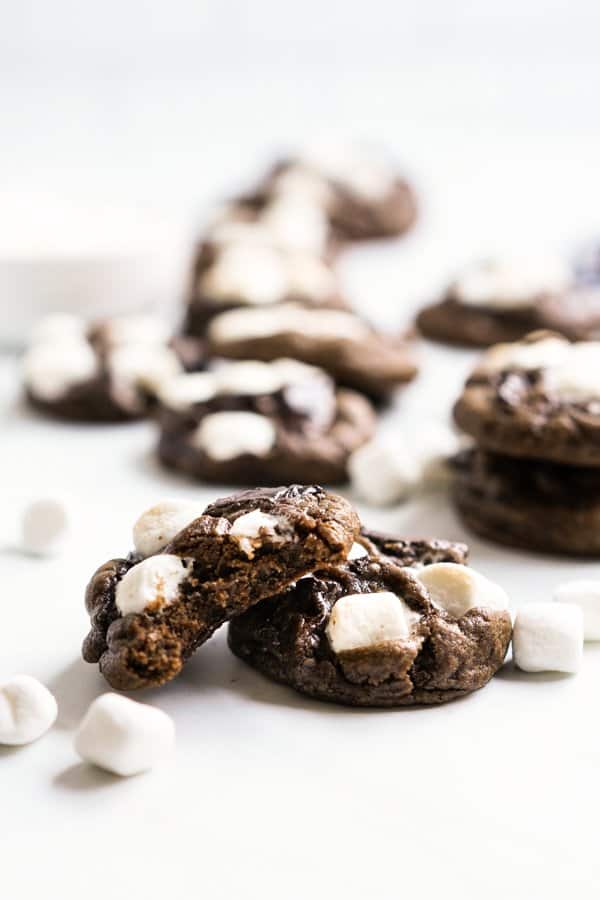 Chocolate Marshmallow cookies spread across a surface