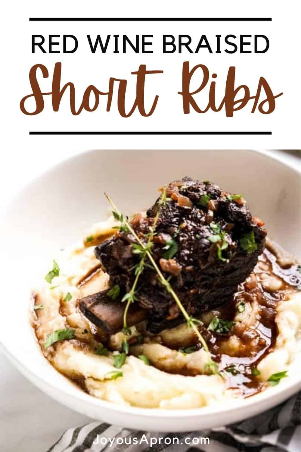 Red Wine Braised Short Ribs - Tender, fall-apart braised beef short ribs cooked in the Dutch Oven is an elegant and delicious meat main dish that is easy and delicious. Flavored with red wine and fresh herbs, it's perfect for holidays, special occasions and more. via @joyousapron