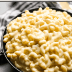 Pinterest pin showing a large closeup bowl of smoked gouda mac and cheese