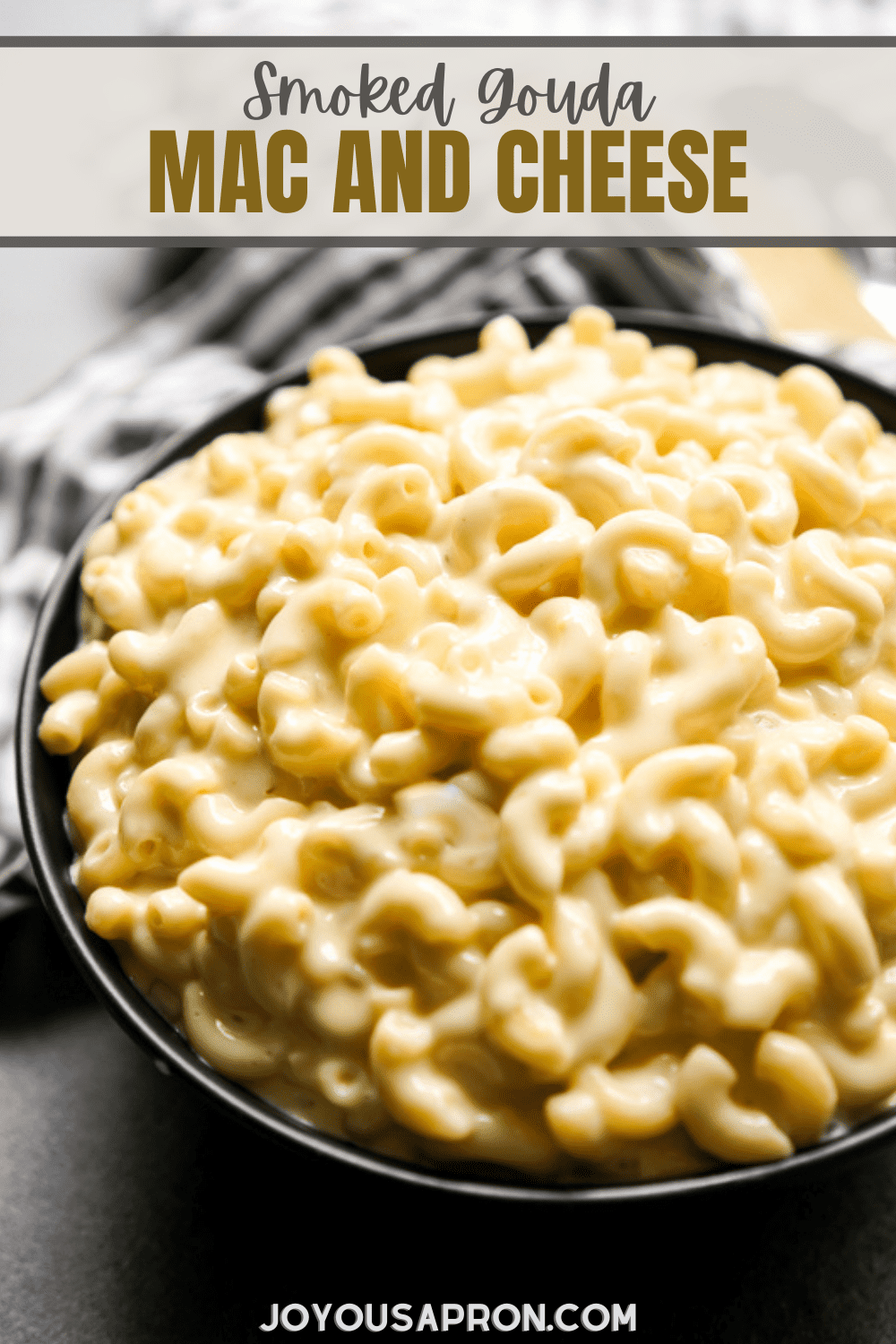 Smoked Gouda Mac and Cheese - Silky, creamy, easy, BEST macaroni and cheese side dish. Cooked on the stove top, the classic comfort food combines smoked gouda cheese, milk, and cream. via @joyousapron
