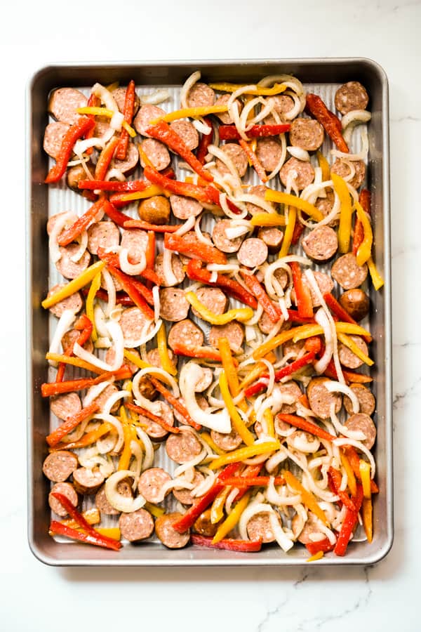 Sheet pan with sausage, bell peppers and onions