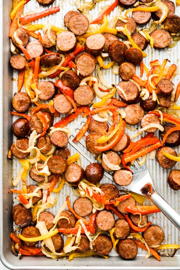 Sheet pan sausage and peppers after baking