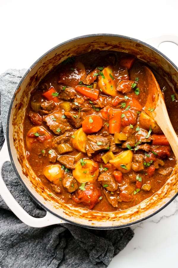 Top down view of a pot of chunky beef stew in the Dutch Oven