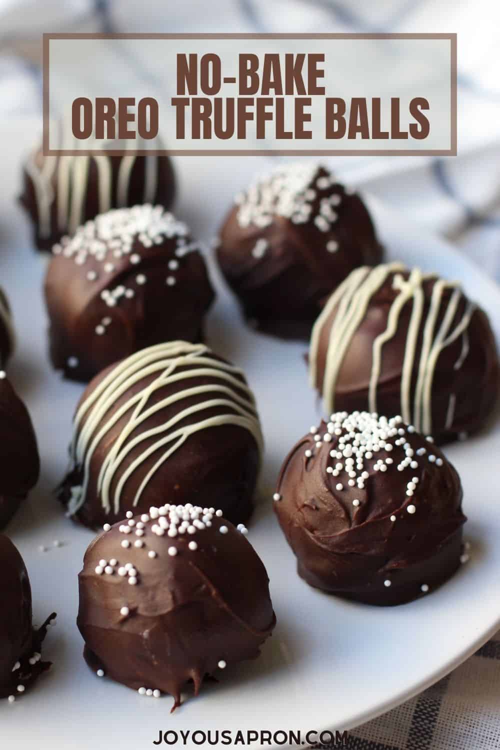 Oreo Truffles - the perfect no-bake treat! These Oreo Balls combine lots of crushed Oreos with cream cheese, covered with lots of chocolate. Such a delicious and easy dessert and sweet treat. via @joyousapron