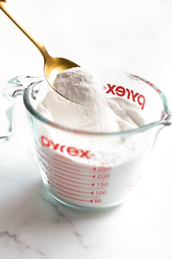 Fine sugar in a measuring cup