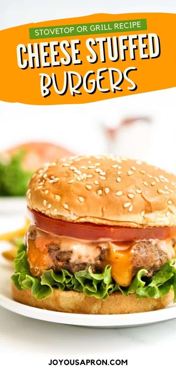 Cheese Stuffed Burger - This stuffed cheeseburger recipe is a fun twist to the classic hamburger. Cheese stuffed beef patties are layered with lettuce, tomato and burger sauce between burger buns. Can be made on the stovetop or on the grill! via @joyousapron