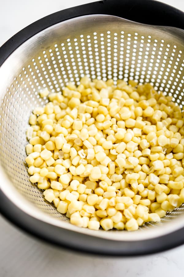 Corn kernels in a colander