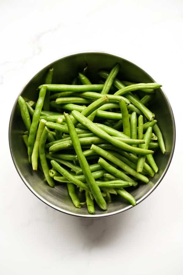 A bowl of raw green beans