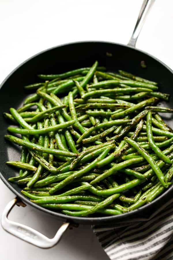 Cooked green beans in a skillet