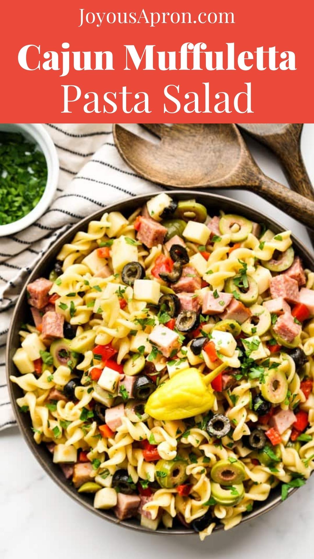 Muffuletta Pasta Salad - classic Cajun Muffuletta sandwich in pasta salad form! Lots of olives, ham, salami, cheese, red bell peppers tossed in a tangy Cajun-style Italian dressing. Perfect side dish for cookout and bbq's. via @joyousapron