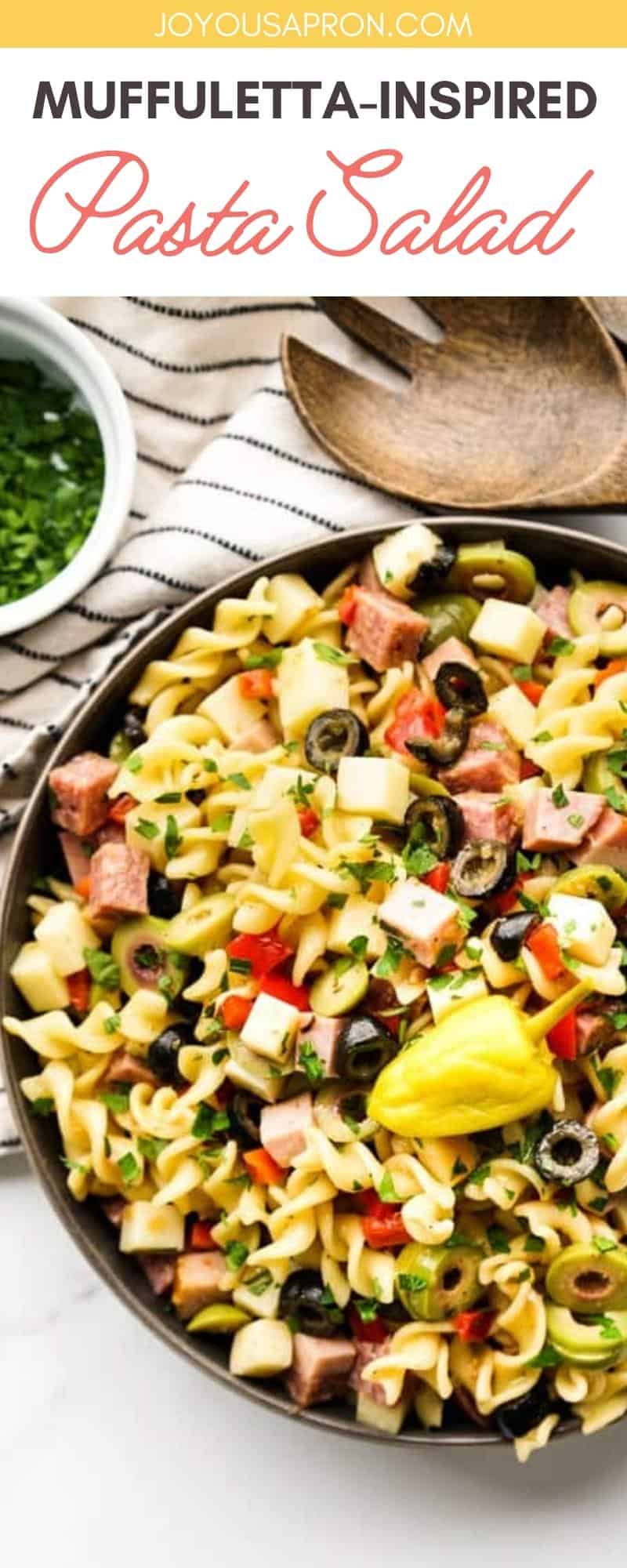 Muffuletta Pasta Salad - classic Cajun Muffuletta sandwich in pasta salad form! Lots of olives, ham, salami, cheese, red bell peppers tossed in a tangy Cajun-style Italian dressing. Perfect side dish for cookout and bbq's. via @joyousapron