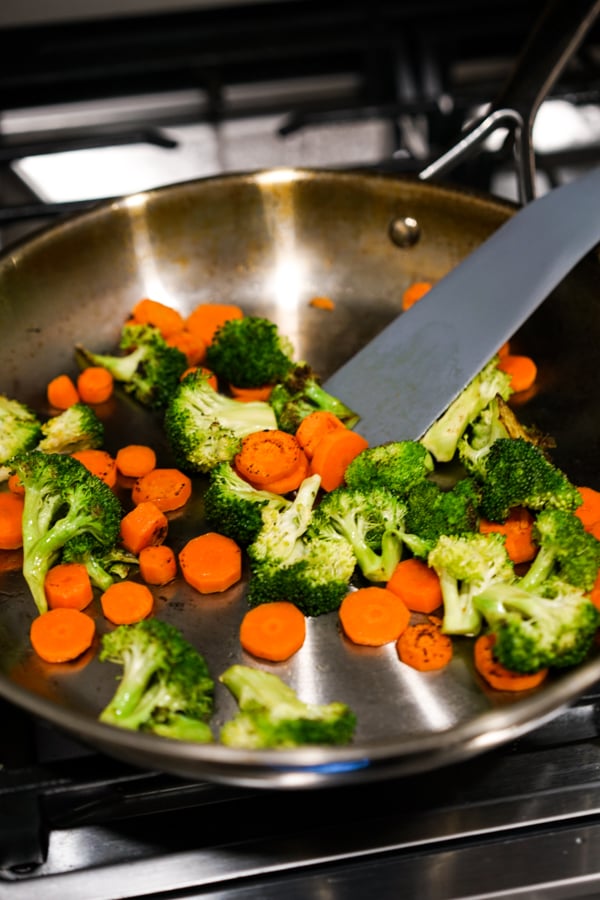 Stir frying broccoli and carrots