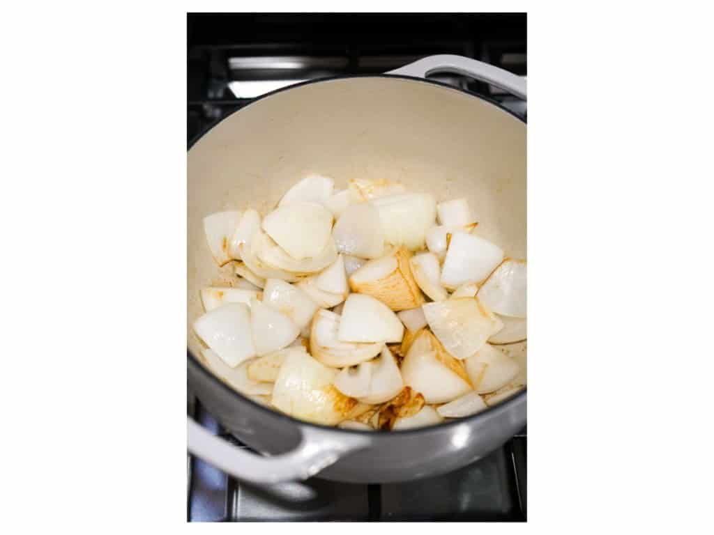 Searing onions and garlic in the pot