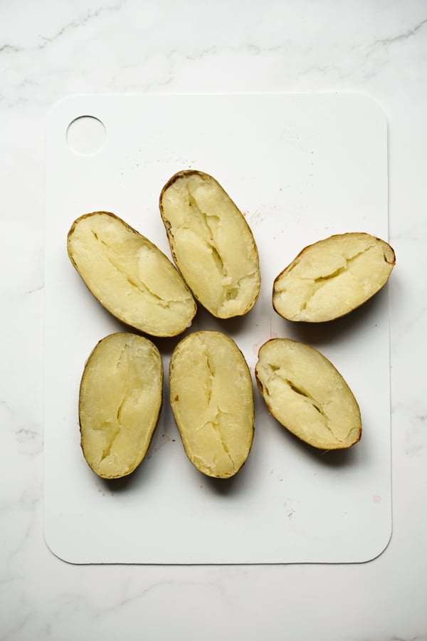 Russet potatoes slices into half lengthwise