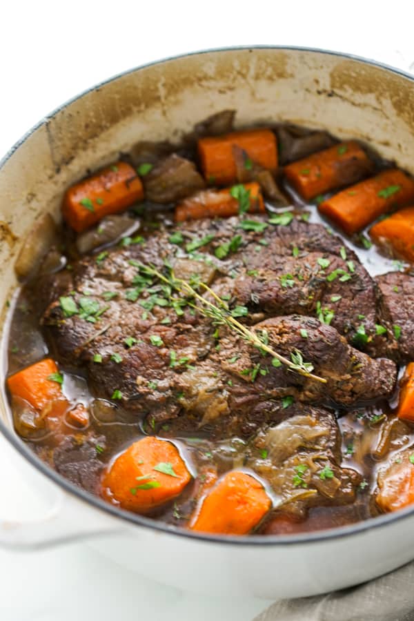 Pot Roast and carrots in gravy in the Dutch oven