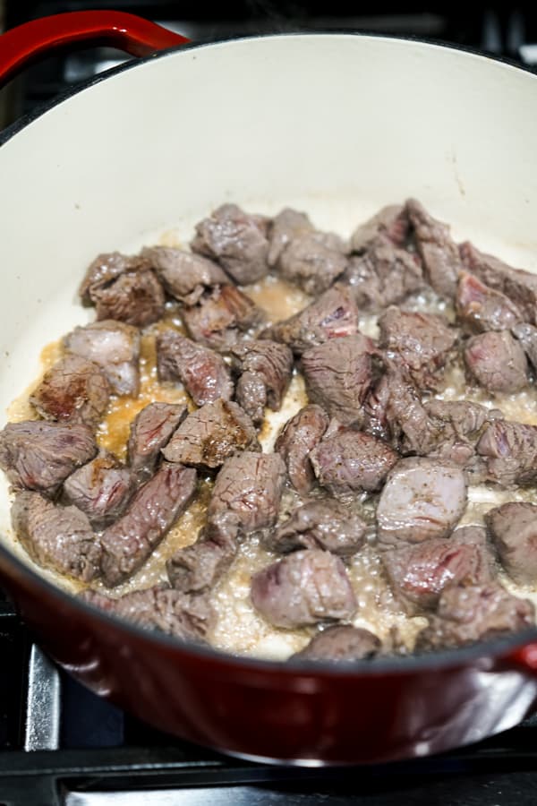 Searing steak pieces in Dutch oven on stove top