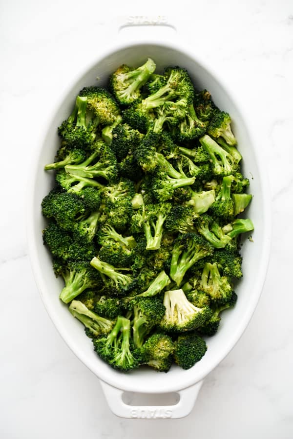 Roasted broccoli in a oval gratin bowl