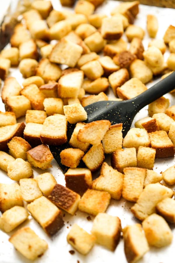 A sheet pan of homemade croutons