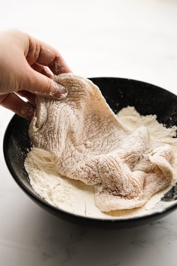 Coat chicken in flour mixture
