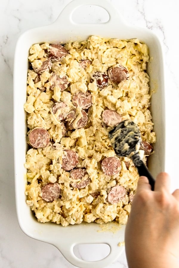 Spreading potato casserole mixture out on baking dish