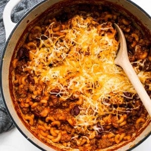 A white pot of chili mac and cheese