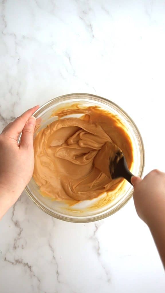 creamy melted peanut butter in a bowl