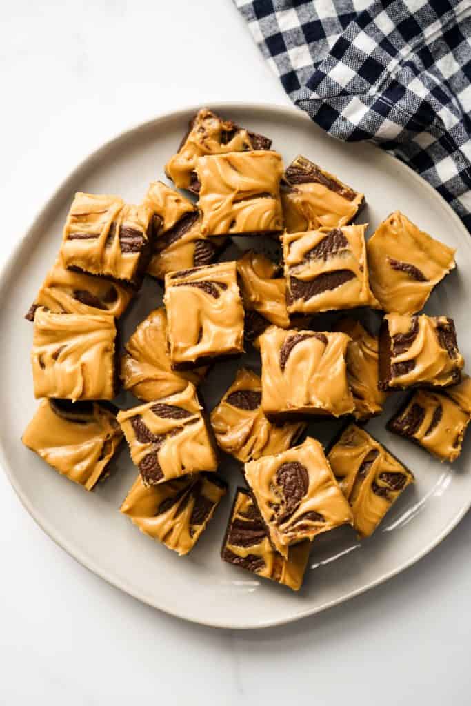 Top down view of a plate of fudge in small squares