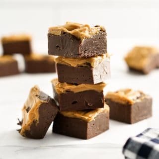a stack of chocolate peanut butter fudge