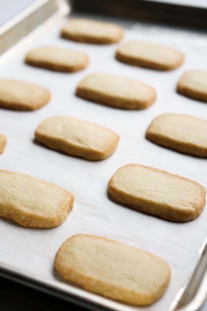 Baked shortbread cookies on baking sheet