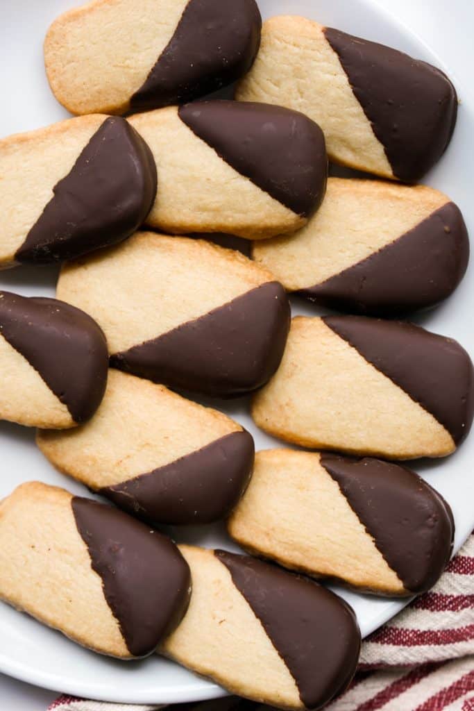 A bunch of shortbread cookies dipped in chocolate