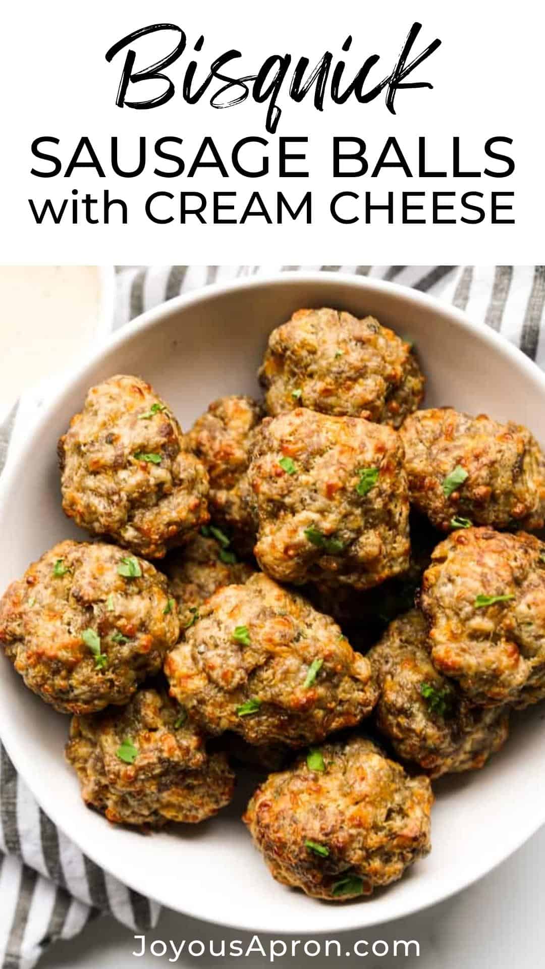 Cream Cheese Sausage Balls - the perfect appetizer, finger food and party food for game day and Superbowl Sunday. A combination of ground sausage, cream cheese, Bisquick mix, cheddar and herbs make these sausage balls moist and flavorful. via @joyousapron