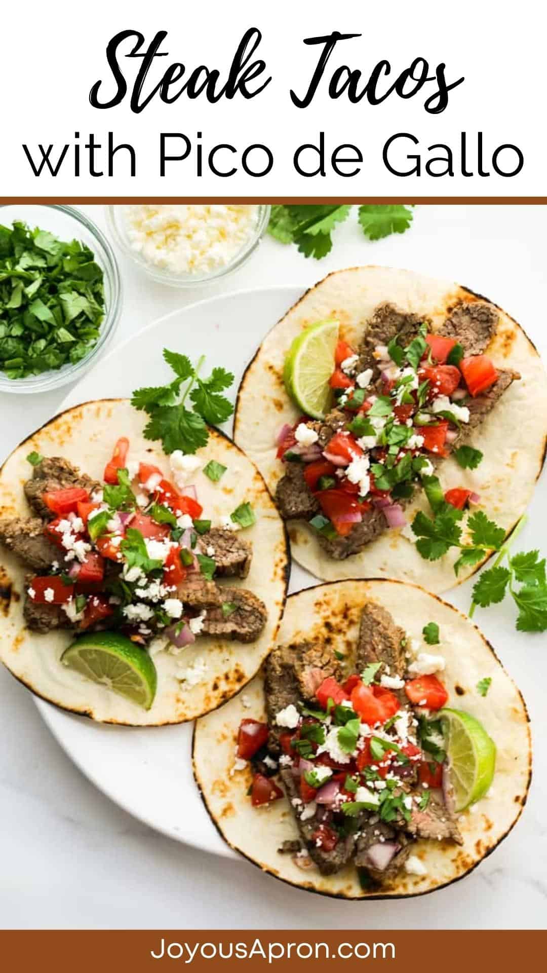 Grilled Steak Tacos - a simple beef taco recipe made on the grill or grill pan. Wrapped in flour tortilla and topped with tomatoes, jalepenos and lime juice mixture, queso fresco and more cilantro. Easy, healthy and delicious! Makes for an easy dinner meal. via @joyousapron