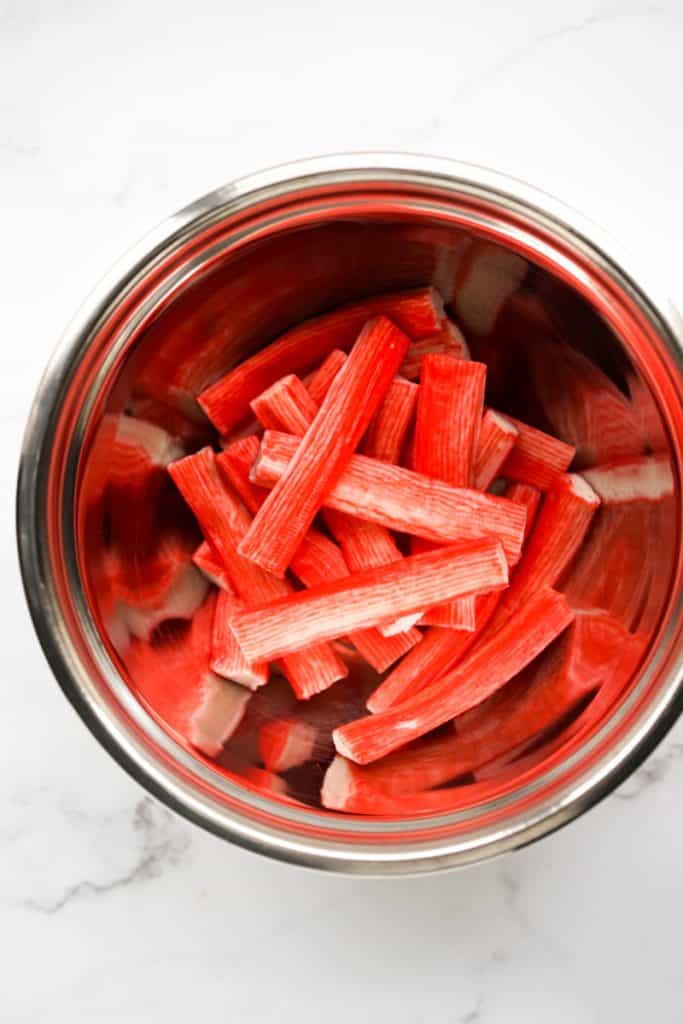 Imitation crab meat in a bowl