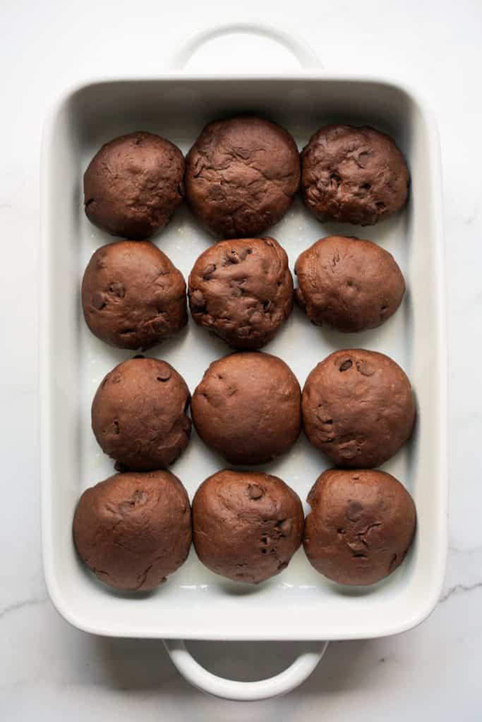 Risen chocolate chocolate chip hot cross buns dough